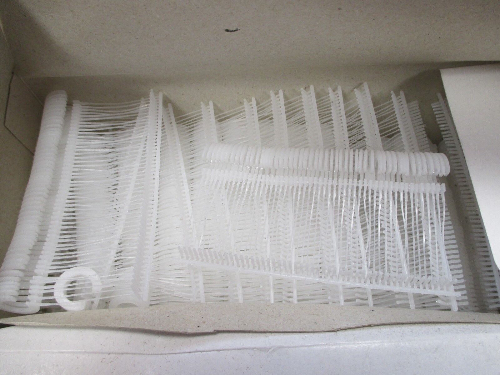 Display Guru Plastic Hook Pins – 5000pcs per Box (White)
